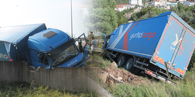 Kargo aracı bariyerleri kırıp aşağı uçtu